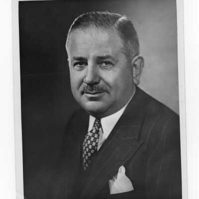 Individual photograph of Frank M. Folsom, honorary degree recipient during 1948 graduation/commencement.
