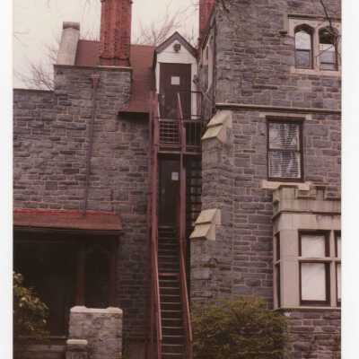 Side view of Wolfington Center (formerly Gest Estate, Neumann Hall) with two-story steps.