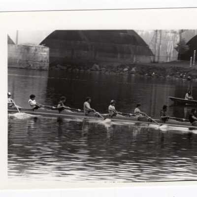 Men's crew/rowing team practicing on Schuylkill River.