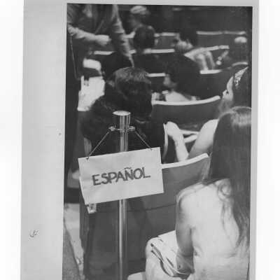Pax Romana's 20th World Plenary Assembly meets at Saint Joseph's College, August 1968. View of audience making use of Spanish translation of Lecture.