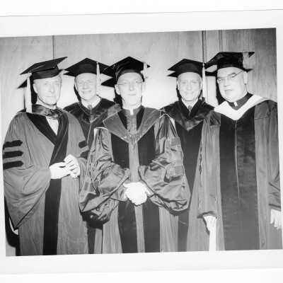 J. Joseph Bluett, S.J., with four recipients of honorary degrees.