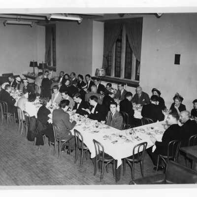 Dinner during international debate with Oxford including Edward G. Jacklin, S.J., Matthew G. Sullivan, S.J. and others. Dinner held in Barbelin?
