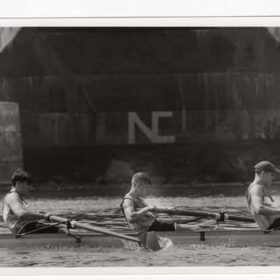 Men's crew/rowing team practicing on Schuylkill River.