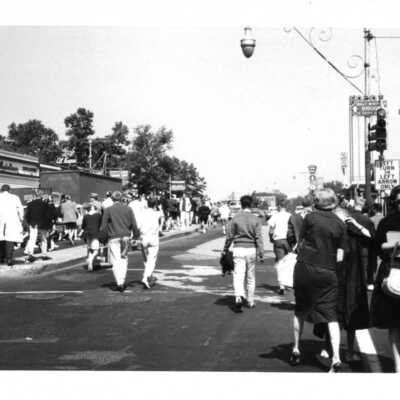 Student booster club pep rally/car parade down City Avenue.