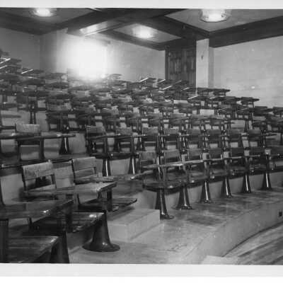 Interior of classroom seating with desks in amphitheater in Barbelin building.