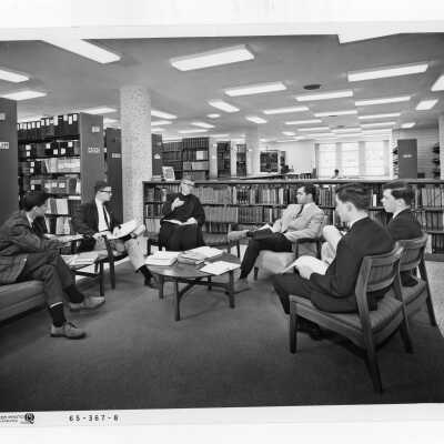 Jerome Coll, S.J., holding Honors Program class in Drexel Library, c. 1968.