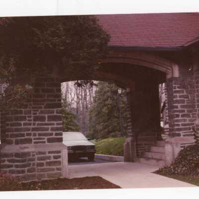 View of covered archway entrance on driveway to Saint Mary's Hall.