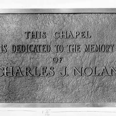 Dedication plaque in chapel in Barbelin dedicated to Charles J. Nolan.