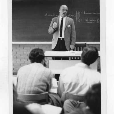 Francis J. Morris, one photo Morris in his classroom, and the second of him teaching a class.