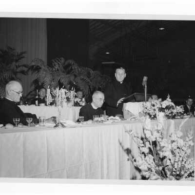 Testimonial dinner for Joseph S. Hogan, S.J., with Bishop Joseph McShea, May 26, 1957.