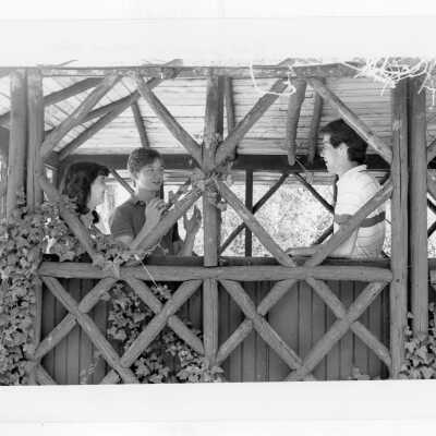 Students talking in old gazebo of Boland Hall.