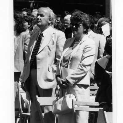 View of parents, family, and guests attending outdoor Baccalaureate service, graduation/commencement, c. 1985.