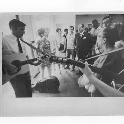 Pax Romana's 20th World Plenary Assembly meets at Saint Joseph's College, August 1968. Group of guitarists and singers practice before liturgy.