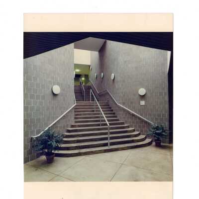 View of hallway and steps in Sports Complex.