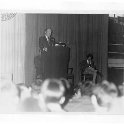 Vice President Hubert Humphrey speaking from podium in Field House during his visit to SJC campus, January 27, 1970.