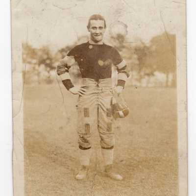 Saint Joseph's Prep football player standing on field.