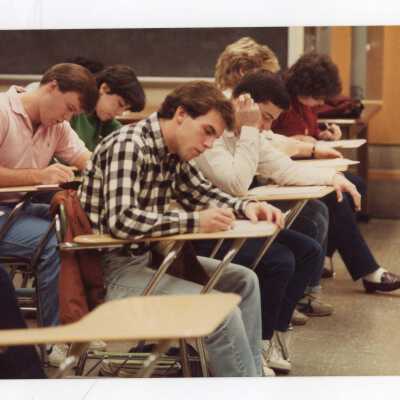 Students taking test in classroom.
