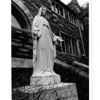 View of statue of Virgin Mary and World War Two memorial in Barbelin quadrangle.