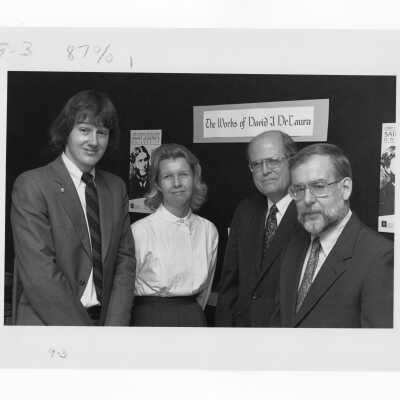 English professors Ronald C. Wendling and David R. Sorensen, and speaker, David J. DeLaura, with reference librarian Ene Andrilli during Honors Lecture Series in Drexel Library, 1989.
