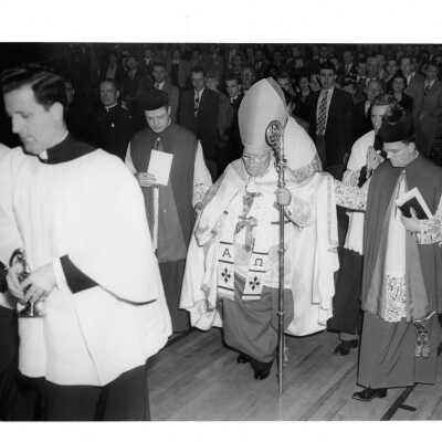 Interior view of Field House (Sports Complex) dedication with Dennis Cardinal Dougherty, Msgr. Francis Furey, and others.