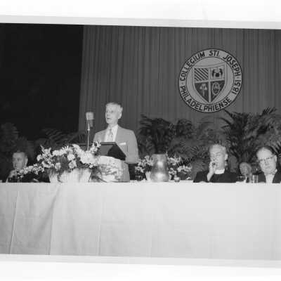 Testimonial Dinner for Joseph S. Hogan, S.J. for 75th Birthday and 35th Anniversary with J. Joseph Bluett, S.J., Bishop Joseph McShea, and Daniel J. Dougherty, May 26, 1957.