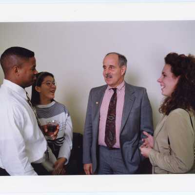 James L. Bowditch (Dean, College of Business and Administration; Professor of Management and Information Systems) with students.