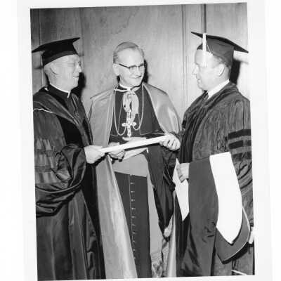J. Joseph Bluett, S.J., with honorary degree recipients John Cardinal Krol and J. Peter Grace during 1961 graduation/commencement.
