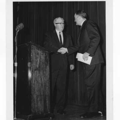 Dr. James Dougherty welcoming Senator Hubert Humphrey during visits to campus to deliver speech.