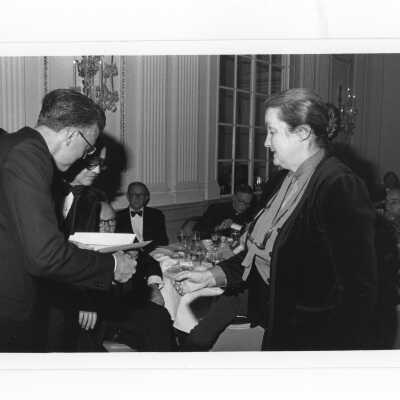 Donald I. MacLean, S.J., with Mrs. Joseph (Mary) Eichman, M.D., at alumni awards dinner, c. 1980.