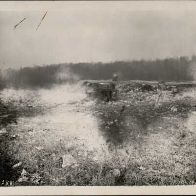 View of City Avenue dump site, an area near the City Avenue site of Saint Joseph's College (?), November 10, 1919. Model T automobile (?) in background.