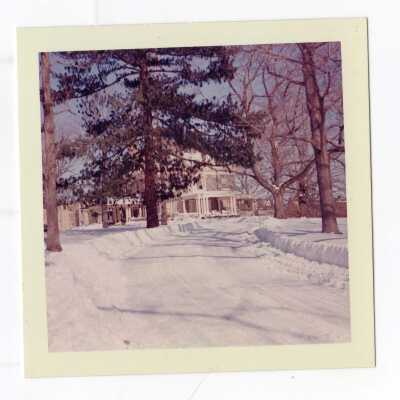 View of Loyola Hall driveway with snow plowed.