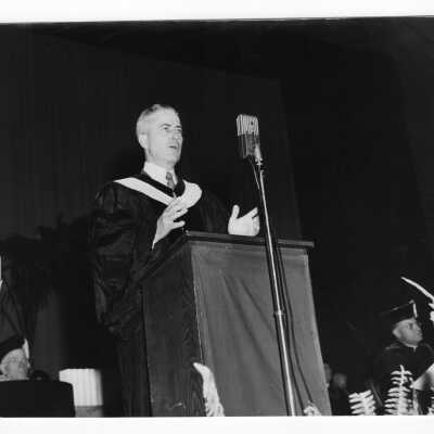 Bartholomew Sheehan addressing the graduating students at 1954 graduation/commencement ceremony.