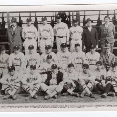 Group photo of 1928 baseball team with coaches.