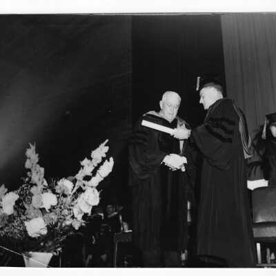 Edward G. Jacklin, S.J., conferring honorary degree on Joseph Breen, class of 1908