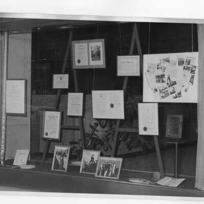 PNC (Phildadelphia National Bank) display of SJC memorabilia along with photographs of Dennis Comey, S.J. on the Philadelphia docks and waterfront.