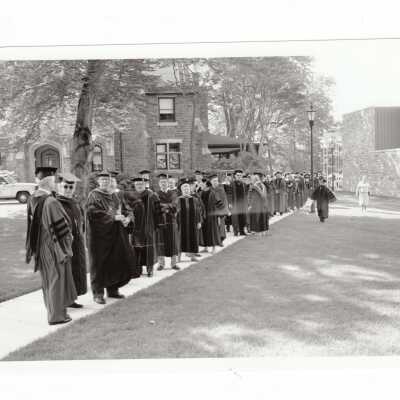 Faculty processing between Wolfington and Chapel to 1993 graduation/commencement for graduate students.