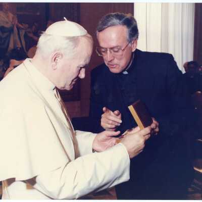 Donald I. MacLean, S.J., presenting commemorative medal to Pope John Paul II in Rome, 1985.