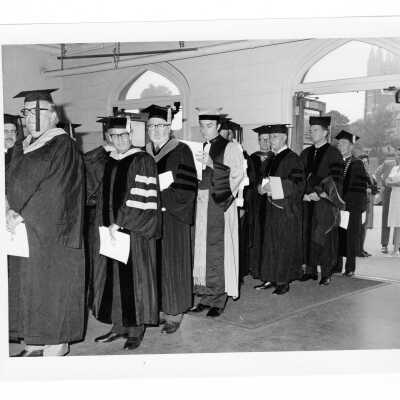 Faculty processing nito Field House during September 1971 graduation/commencement.