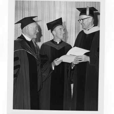 Inauguration of President Terrence Toland, S.J., November 14, 1968. Toland is pictured with two living previous Presidents, Thomas J. Higgins, S.J., and Willliam F. Maloney, S.J.