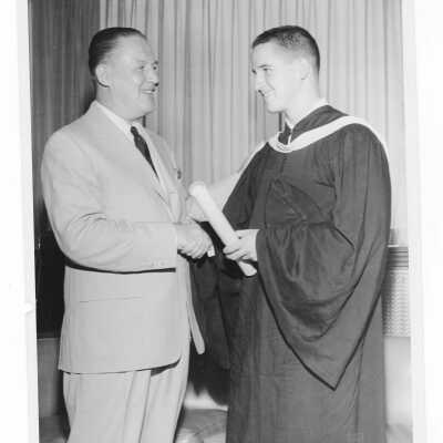 Graduating student, James Phillips Mallie, with his alumnus father, James McG. Mallie, Esq. (class of 1927) during 1955 graduation/commencement.