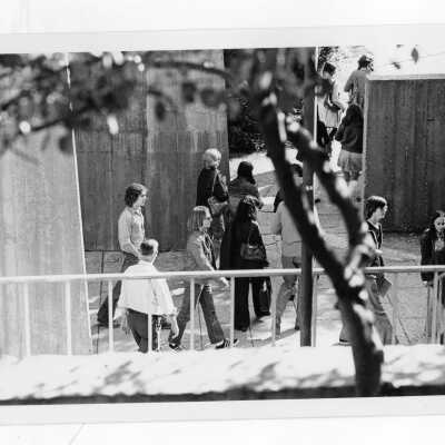 Students walking alongside Bellarmine building.