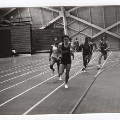 Men's indoor track meet with team member Charles Kelly