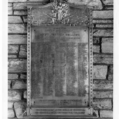 Plaque on stone wall of Barbelin honoring students and alumni of Saint Joseph's College who served in World War One [World War I].