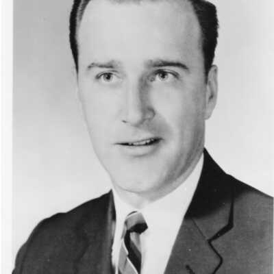 Men's Basketball, Coach Jack McKinney.