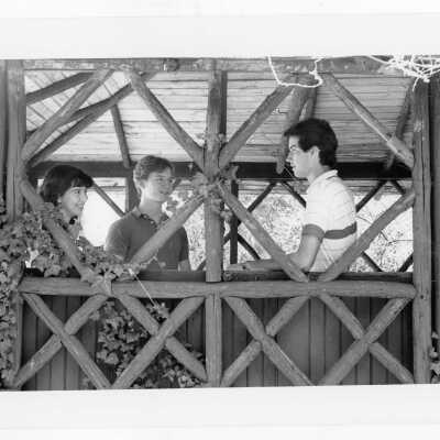 Students talking in old gazebo of Boland Hall.