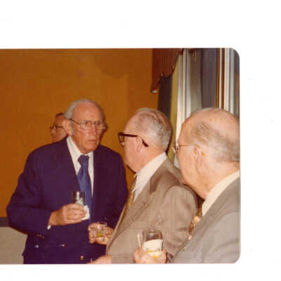 Alumni reunion of class of 1931 held on May 18, 1976. View of alumni arriving in cars and at gathering with Terrence Toland, S.J