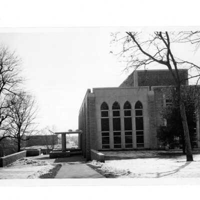 Exterior side view of Drexel Library with Field House (?) in distant background.