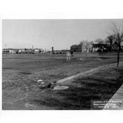 View of lot for Villiger (later Post) Academy of Food Marketing before excavation work began. The photograph is notarized and dated March 4, 1964