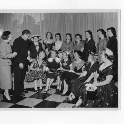 Edward G. Jacklin, S.J., with group of women attending reception of Board of Governors of the Alumni Association and Medical Alumni Association of Saint Joseph's College, September 11, 1955.