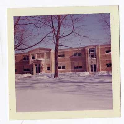 Front view of Jesuit Faculty Residence in snow.